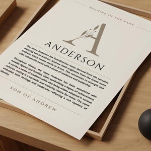 May include: A beige printable art print with a brown decorative border. The print features a stylized letter A with a floral design and the word "Anderson" in a brown font. The text below explains the meaning of the name Anderson, stating that it has Scandinavian roots and is derived from the surname meaning "son of Andrew".