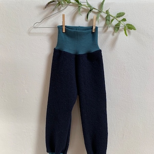 Wool felt trousers with wool cuffs
