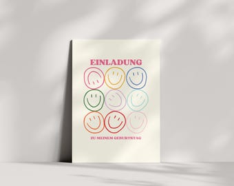 May include: A cream-colored poster with the German text "EINLADUNG ZU MEINEM GEBURTSTAG" in pink. Nine colorful smiley faces are arranged in a 3x3 grid. The smiley faces are outlined in various colors.