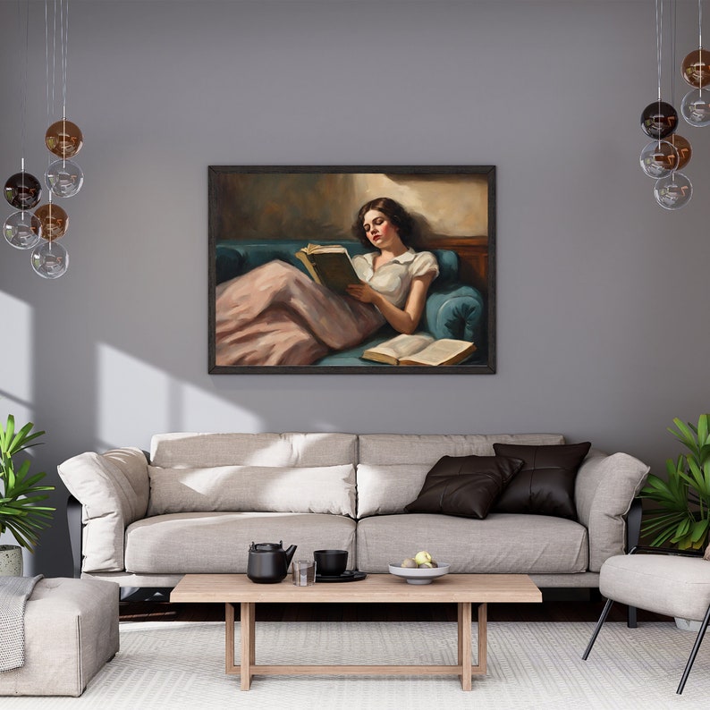 May include: A painting of a woman in a pink dress reading a book while reclining on a blue couch.