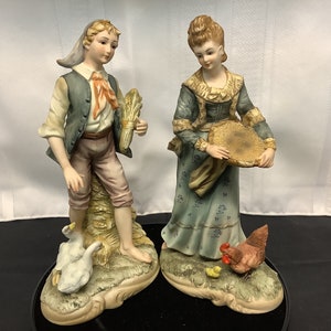 Lefton figurines Farming Couple Figurine.Hand Painted, Circa 1949 1955. Set of 2.
