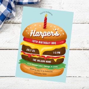May include: A blue and yellow birthday party invitation with a cartoon burger illustration. The invitation says "You're invited to Harper's 10th Birthday BBQ" with the date "July 25" and time "1-3 PM". The invitation also includes the address "1234 Sesame Lane | Chicago, IL 12345" and RSVP information.
