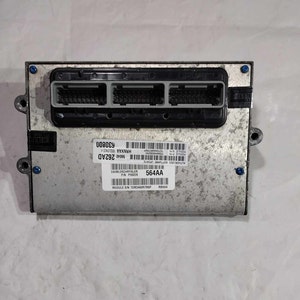 May include: A silver automotive control module with three black connectors and a label that reads "00800CY 5292AD  WMXK4  564AA  MODULE S/N 1EM304868R98P".