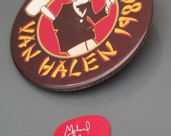 Red one sided Michael Anthony guitar pick and 1984 3-in. pin both from the 1984 tour I personally caught the pic in the third row.