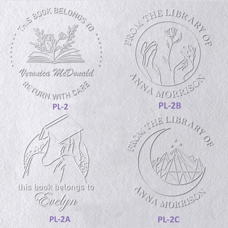 May include: Four circular embossed designs on white paper. Top left: open book with flowers, text 'THIS BOOK BELONGS TO Veronica McDonald RETURN WITH CARE'. Top right: hands holding a flower, text 'FROM THE LIBRARY OF ANNA MORRISON'. Bottom left: person reading, text 'this book belongs to Evelyn'. Bottom right: crescent moon and mountains, text 'FROM THE LIBRARY OF ANNA MORRISON'.