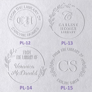 May include: Four circular embossed library stamp designs on white paper. PL-12 features 'FROM THE LIBRARY OF CARLYNE HOMES' with 'CH'. PL-13 shows 'CARLINE HOMES LIBRARY' with 'C' and a leaf wreath. PL-14 displays 'FROM THE LIBRARY OF Veronica McDonald'. PL-15 shows 'FROM THE LIBRARY OF CARLINE SMITH' with 'CS' and a leaf wreath.