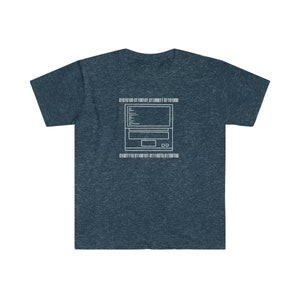 May include: Dark blue t-shirt featuring a white outline of a laptop with code on the screen and binary code above and below the laptop. The shirt is made of a soft, comfortable material.
