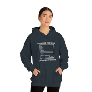 May include: A dark blue hooded sweatshirt with a white outline of a computer with binary code above and below the image. The code reads "01010100 01100101 01100011 01101000 01101001 01110011 01110100 01101000" and "01001110 01101100 01101001 01110100 01101000 01101001 01110011 01110100".