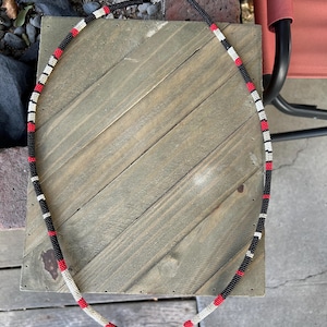 Black/red/silver/eggshell beaded necklace