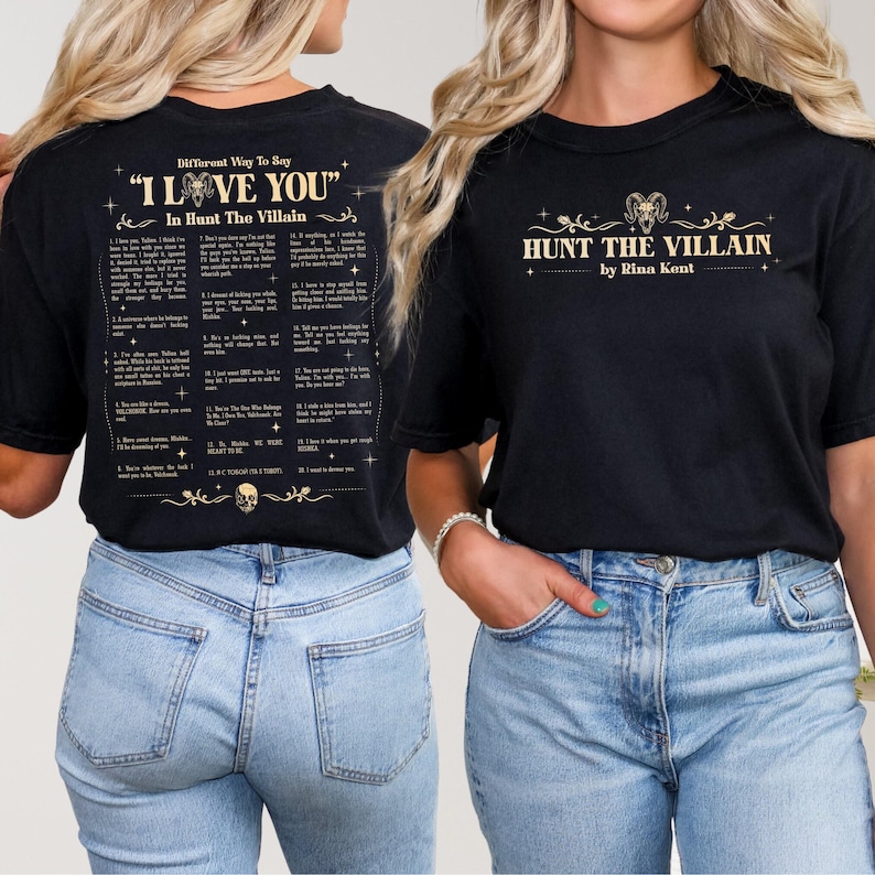 May include: Black t-shirt with gold text that reads "HUNT THE VILLAIN by Rina Kent" on the front. The back of the shirt has a list of phrases under the title "Different Way To Say 'I LOVE YOU' In Hunt The Villain".