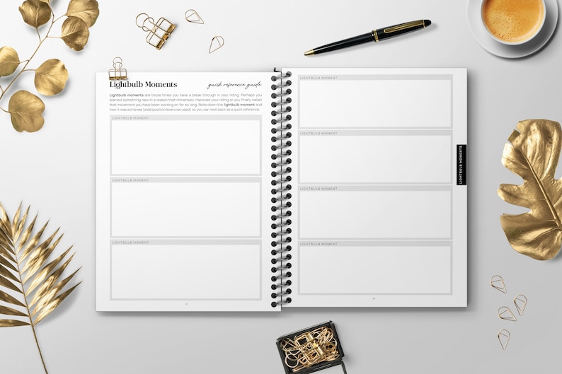May include: A white spiral bound journal with the title "Lightbulb Moments" and the text "quick reference guide". The journal has blank pages for writing down ideas and thoughts.