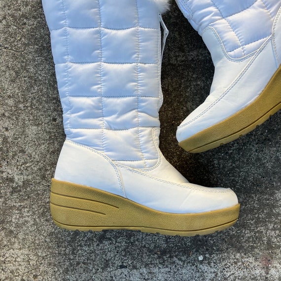 White wedge boots with cheap fur