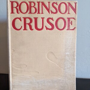 Antique Robinson Crusoe hard cover book