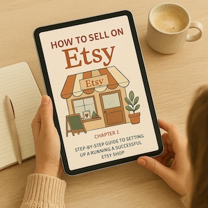 May include: A tablet displaying the title "HOW TO SELL ON Etsy" with an illustration of an Etsy shop. The image includes the text "CHAPTER 1 STEP-BY-STEP GUIDE TO SETTING UP A RUNNING A SUCCESSFUL ETSY SHOP". A cup of coffee and a notepad are also visible.