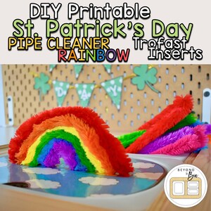 May include: DIY printable St. Patrick's Day pipe cleaner rainbow trofast inserts. A rainbow made of pipe cleaners is placed in a blue and white tray with clouds. A wooden sign with the words "Beyond the Bin" is in the lower right corner of the image.