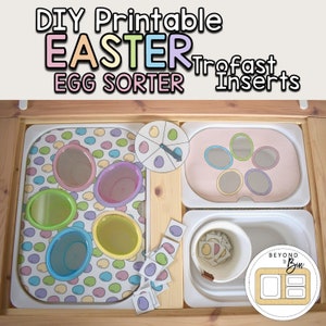 May include: DIY printable Easter egg sorter Trofast inserts.  A white tray with a colorful egg pattern and five different sized circles cut out.  A white tray with four circles cut out.  A white tray with a basket and a set of colorful egg stickers.  A white tray with a spinner with four different colored eggs.  The text "Beyond the Bin" is on a brown circle with a white background.