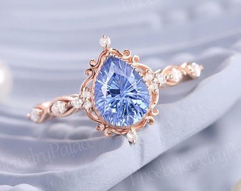 Einzigartige Birne Blauer Saphir Verlobungsring Stern Facettierung Saphir Eheringe für Frauen Art Deco Lünette Moissanite Cluster Ring Geschenk