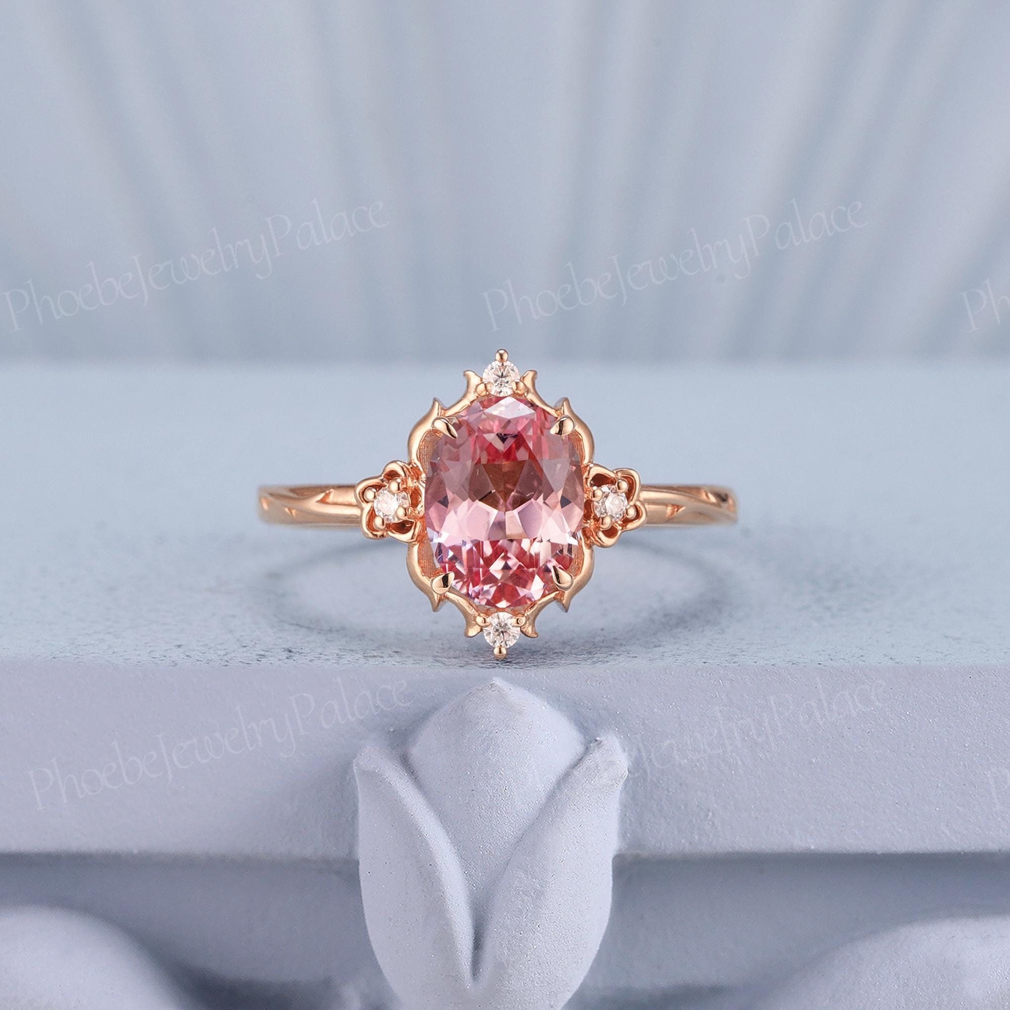 ユニークなピンクサファイアエンゲージリング ヴィンテージオーバル