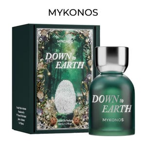 May include: A green perfume bottle with a silver cap and a matching box. The bottle and box both feature the text "DOWN to EARTH" and "MYKONOS". The box has a forest scene with a fingerprint.