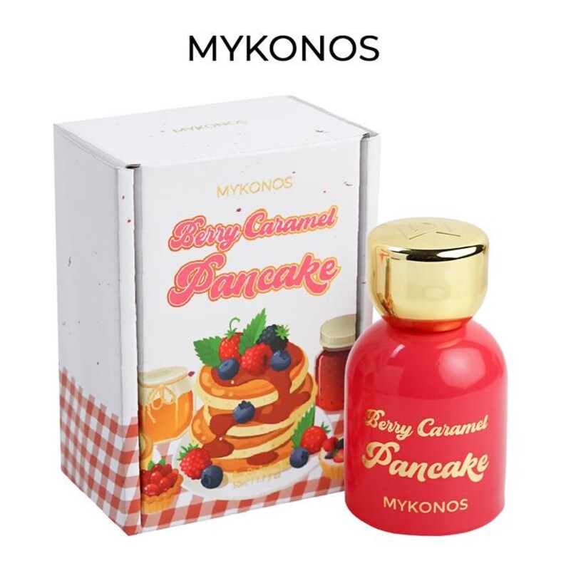 Puede incluir: Un frasco de perfume rojo con tapa dorada junto a una caja blanca. Tanto el frasco como la caja presentan la inscripci&oacute;n "Berry Caramel Pancake" en letras doradas. La caja muestra una ilustraci&oacute;n de panqueques con bayas y sirope. Se muestra la marca "MYKONOS".