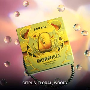 May include: A light green perfume box with the name "MORFOSIA" in a decorative font. The box features yellow floral illustrations and the text "SAFF & Co.". The box contains 35ml of perfume. The bottom of the box reads "CITRUS, FLORAL, WOODY".