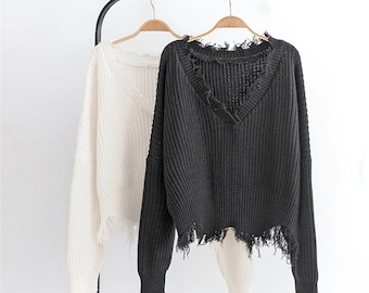 grey frayed sweater