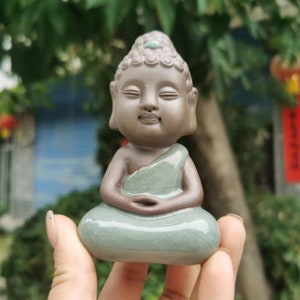 Blue Ceramics Small Buddha Statue Pottery and porcelain Idol Decorative Figurine Praying Meditation Figure Little Monk Figurine Baby Buddha.