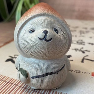 Lovely Ceramic panda Sculpture for Tea Lovers and Animal Enthusiasts Cute Peach Figurine Ornament Yixing zisha Purple Clay Tea Pet Animal .