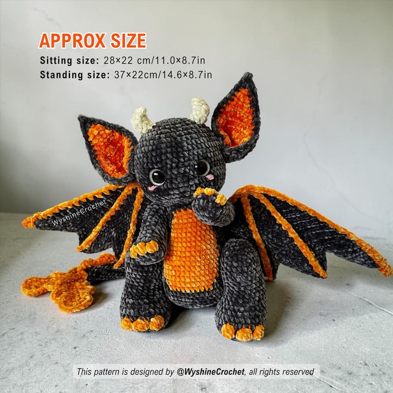 Bat Dragon amigurumi size reference showing approximately 28 cm by 22 cm sitting and 37 cm by 22 cm standing
