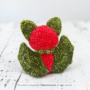 Watermelon Bat Crochet Pattern finished plushie with red green wings, black seeds, and spooky cute fruit bat design