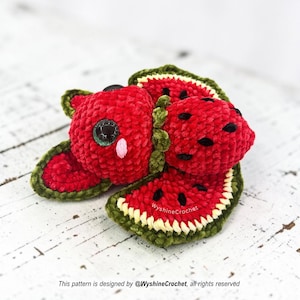 Watermelon Bat Crochet Pattern finished plushie with red green wings, black seeds, and spooky cute fruit bat design