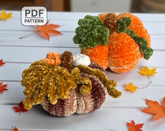 May include: Handmade crochet pumpkins in shades of orange, brown, and green, with detailed leaf and stem accents. The image includes the text "PDF PATTERN". Autumn-themed decorative items.