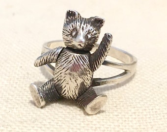 Sterling silver ring with playful teddy bear, stamped, custom made