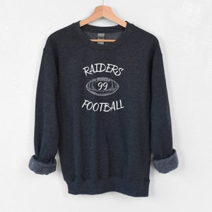 Sudadera de fútbol Raiders personalizada con número de jugador