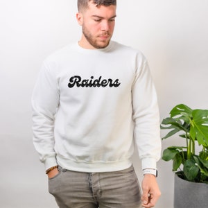 Sudadera de aspecto vintage de los Raiders, gráfico negro, fútbol de la Universidad de Mount Union, Raiders morados