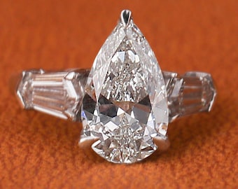 3.00 CT Pear Cut Lab Diamond Three Stone Engagement Ring