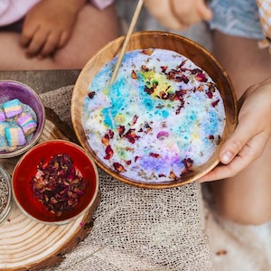 Close-up of fizzing fairy potion ingredients creating bubbles and magical textures for kids activity