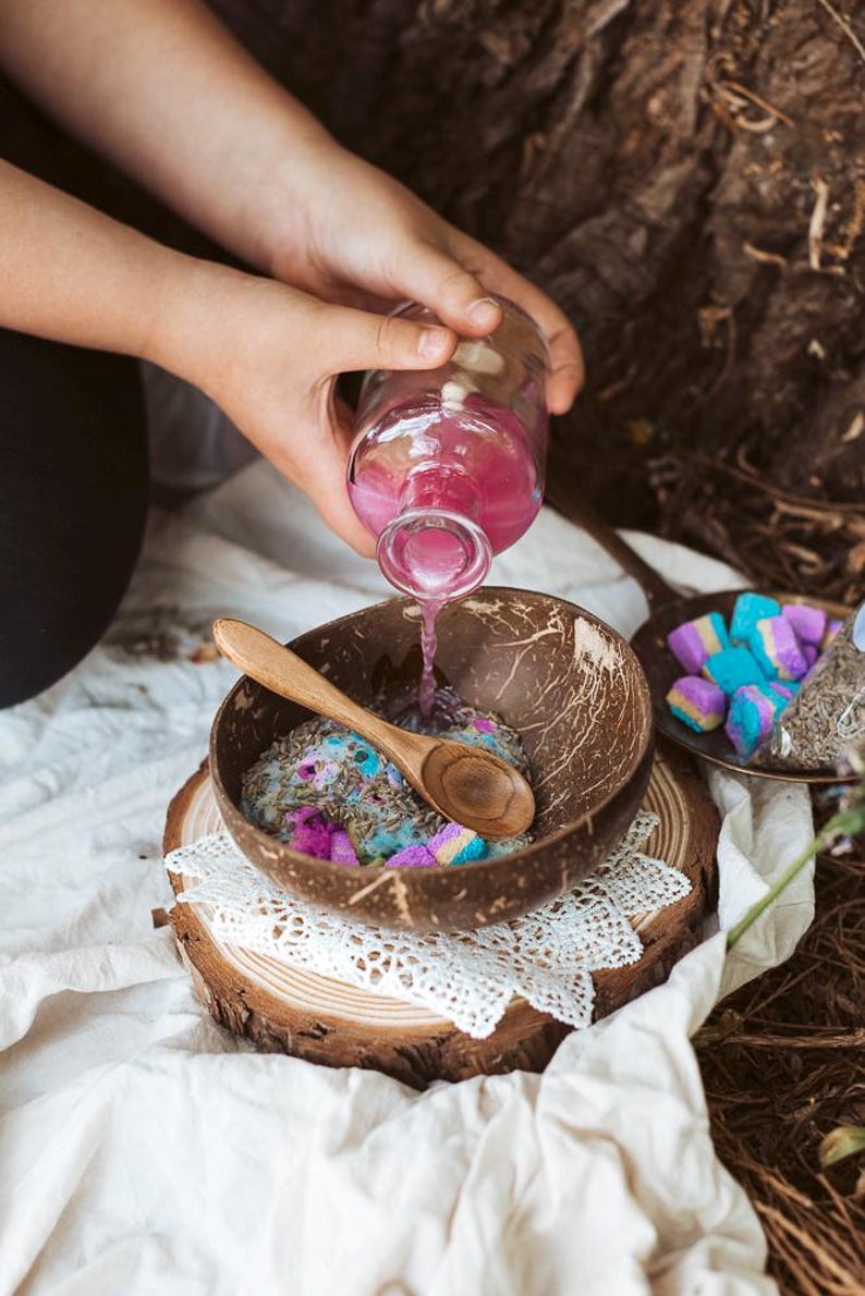 Potion play tools including pipette scoop tweezers and test tube for hands-on sensory activity