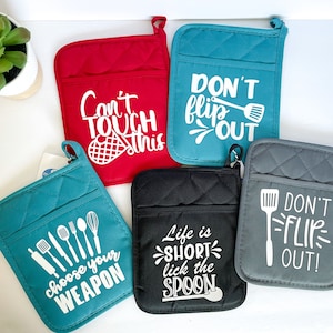 Cute phrased oven mitt/potholder with silicone backing