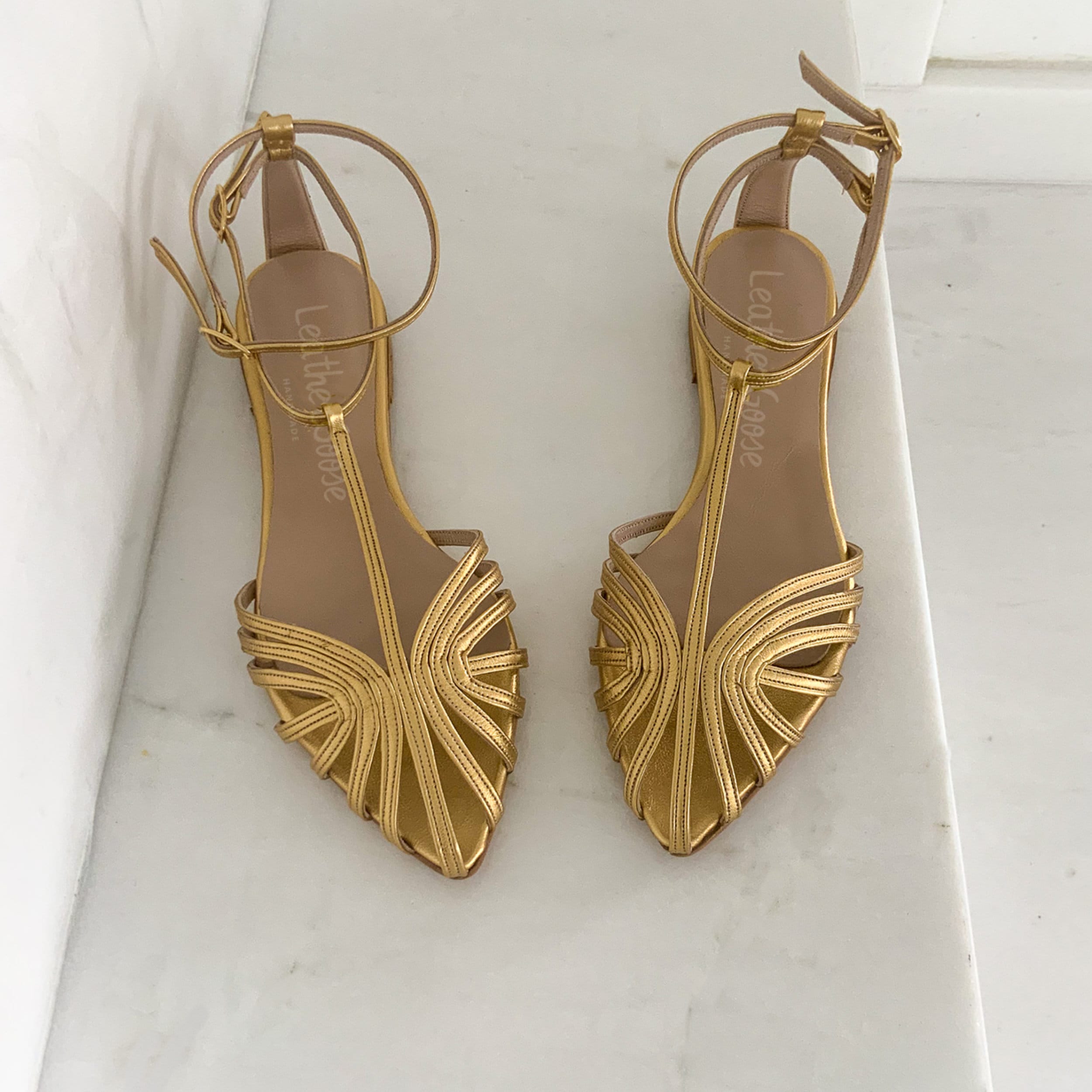 Gold embellished sandals flat hot sale