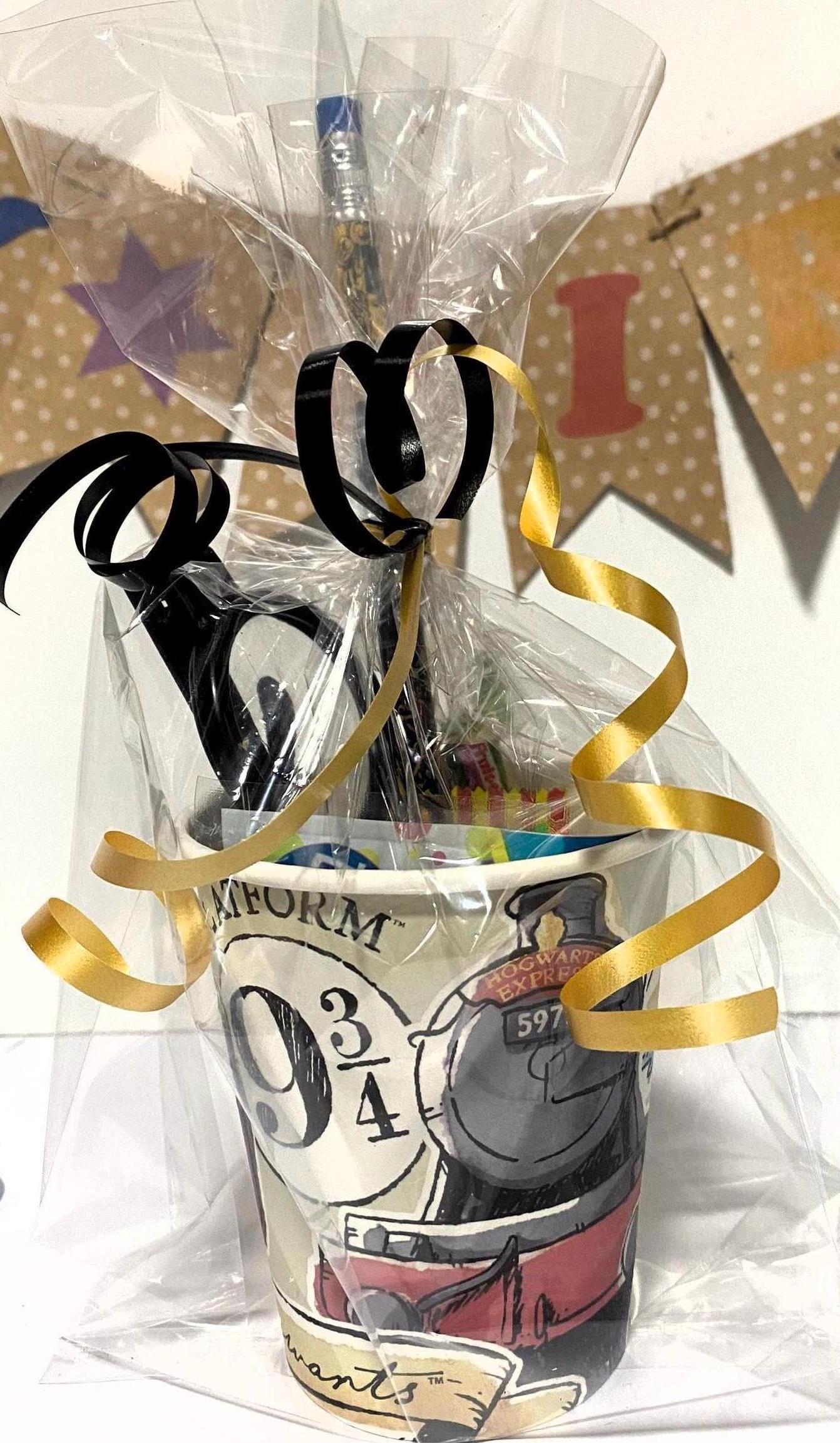 Wizard/HP style filled  paper party cup containing a licensed Harry Potter Product - great alternative to filled party bags/favours