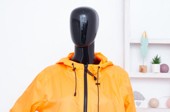 Orange raincoat deals