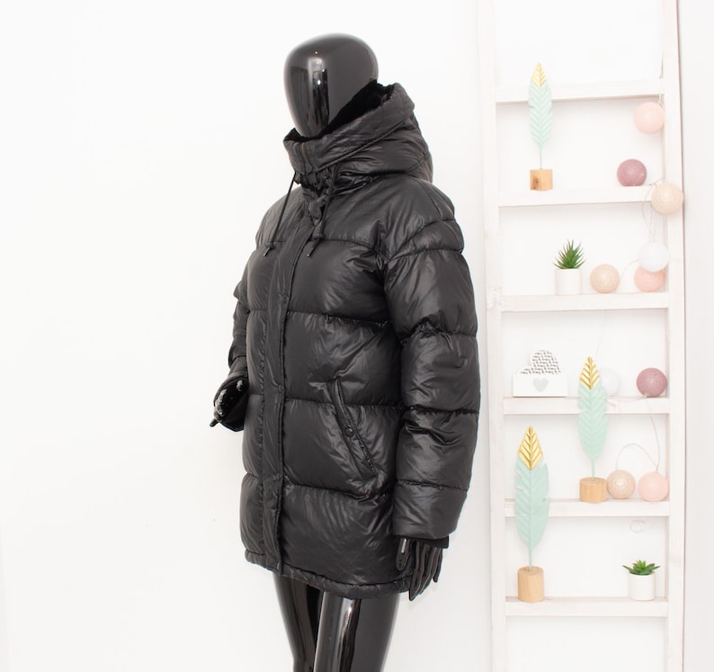 May include: A set of three ceramic mugs with a speckled, matte finish. The mugs are in shades of cream, light gray, and dark gray. Each mug has a simple, minimalist design, perfect for coffee or tea.