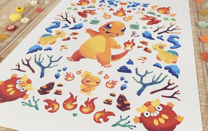 May include: A colorful illustration of a cartoon fire-type Pokemon, Charmander, surrounded by flames, rocks, and trees. The background is white.