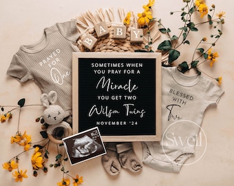 May include: A black letter board with the text "Sometimes when you pray for a miracle you get two Wilson Twins November '24". Two beige baby onesies with the text "Prayed for One" and "Blessed with Two" are displayed with a wooden baby rattle, a sonogram image, and yellow flowers.
