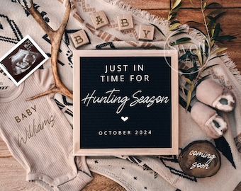 May include: A brown onesie with the text "BABY Williams" in gold lettering. A letter board with the text "JUST IN TIME FOR Hunting Season OCTOBER 2024" is on a brown and white blanket. A small wooden sign with the text "coming soon" is on the blanket. A pair of brown baby booties are on the blanket.