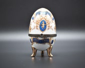 Limoges France Decor vintage Porcelain eggs france jewellery box. 1950s. It has a stamp at the bottom.