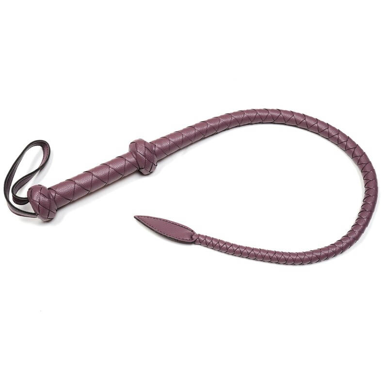 May include: A purple leather whip with a braided handle and a pointed tip.