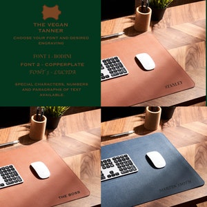 May include: Four different desk mats made of vegan leather with different names engraved on them. The mats are brown, tan, blue, and gray. The mats are all on a wooden surface. The text on the mats reads "Stanley", "The Boss", and "Martin Smith".
