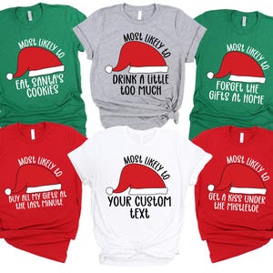May include: Set of six Christmas-themed t-shirts with a red Santa hat graphic and text that reads "Most Likely To..." followed by a humorous Christmas-related phrase. The phrases are: "Eat Santa's Cookies", "Drink a Little Too Much", "Forget the Gifts at Home", "Buy All My Gifts at the Last Minute", "Your Custom Text", and "Get a Kiss Under the Mistletoe".